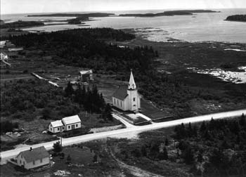 L'église Saint-Joseph, le presbytère et quelques maisons de l'Ile Surette
